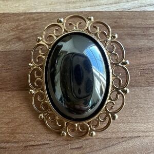 Vintage Brooch Pin 1.5 Inch Ornate Filigree Oval Hematite Cab Ornate Gold Plated